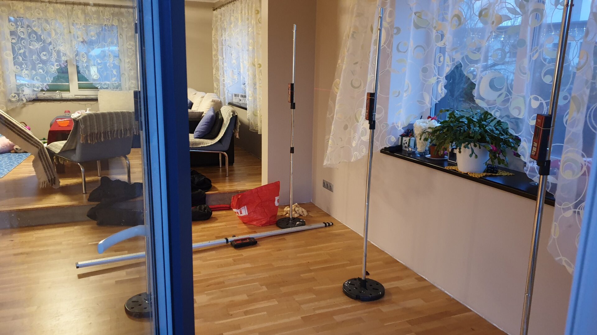 Laser level monitoring during indoor floor stabilization with geopolymer injection in a residential home
